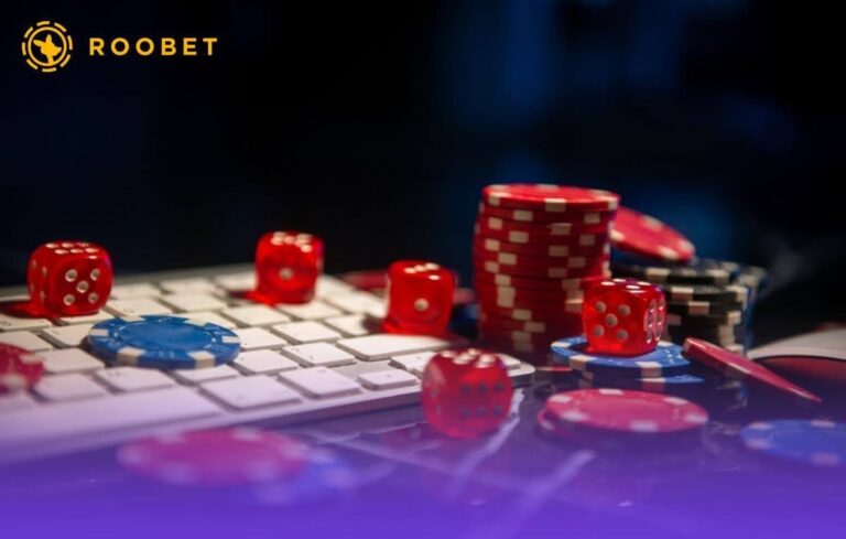 Roobet is bringing modern game design to crypto gaming An image of a keyboard with playing chips and dice